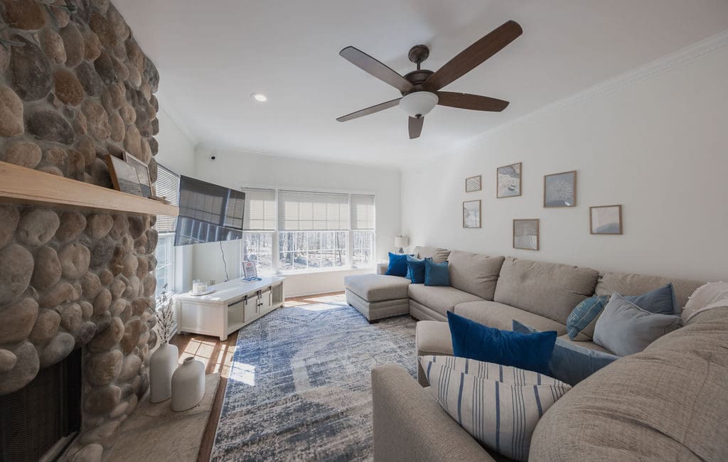 a living room filled with furniture and a fireplace, which could serve as a comforting space for mental health support and treatment in New Jersey